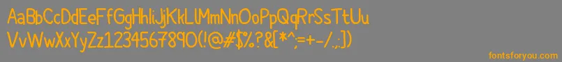 Cartoonero Font – Orange Fonts on Gray Background