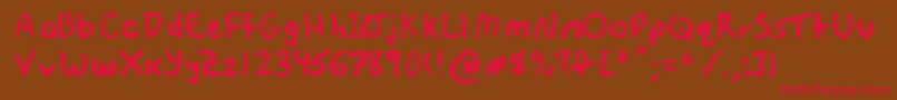 フォントThisFontIsNotATypeface – 赤い文字が茶色の背景にあります。