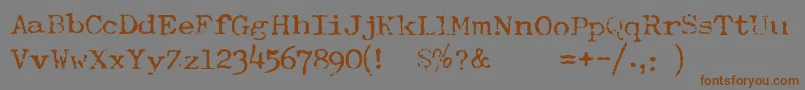 TypewriterFontRoyal200 Font – Brown Fonts on Gray Background