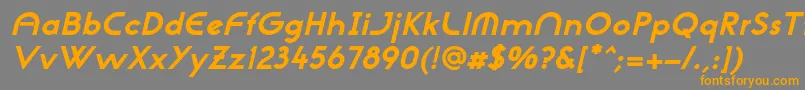 フォントNeogothisadfstdExtrabdoblique – オレンジの文字は灰色の背景にあります。
