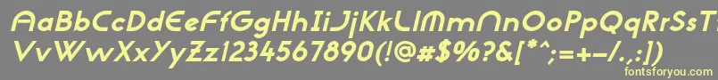 NeogothisadfstdExtrabdoblique-fontti – keltaiset fontit harmaalla taustalla
