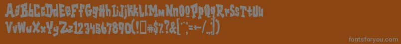 GarageshockcondensedHeavy-Schriftart – Graue Schriften auf braunem Hintergrund