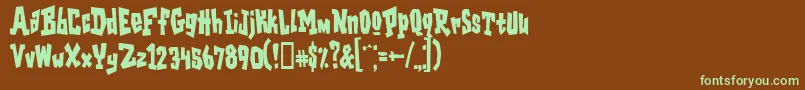 フォントGarageshockcondensedHeavy – 緑色の文字が茶色の背景にあります。