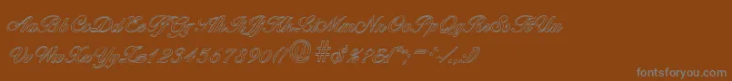 BallantinesoutlineRegular Font – Gray Fonts on Brown Background