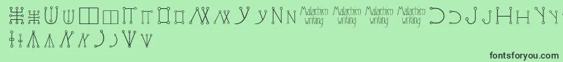 Malachimwriting Font – Black Fonts on Green Background