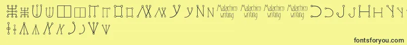 fuente Malachimwriting – Fuentes Negras Sobre Fondo Amarillo