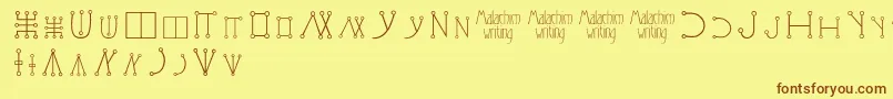 Шрифт Malachimwriting – коричневые шрифты на жёлтом фоне