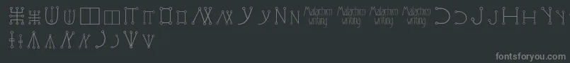 Шрифт Malachimwriting – серые шрифты на чёрном фоне