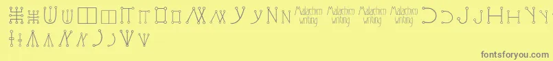 Шрифт Malachimwriting – серые шрифты на жёлтом фоне