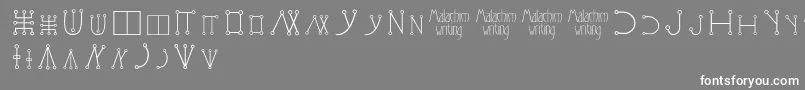 フォントMalachimwriting – 灰色の背景に白い文字