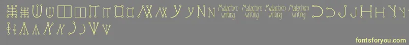 Malachimwriting Font – Yellow Fonts on Gray Background