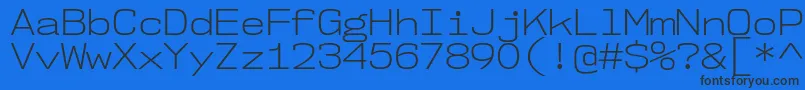 Nk57MonospaceSeLt-fontti – mustat fontit sinisellä taustalla