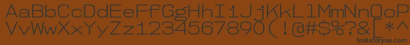 Nk57MonospaceSeLt Font – Black Fonts on Brown Background