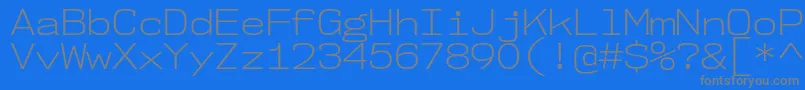 Nk57MonospaceSeLt-Schriftart – Graue Schriften auf blauem Hintergrund