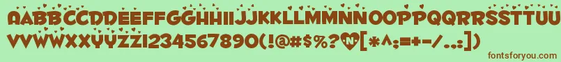 Fontdinerdotcom Luvable Font – Brown Fonts on Green Background