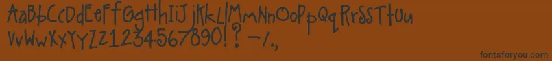 Alittlepot-fontti – mustat fontit ruskealla taustalla