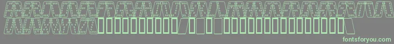 フォントDominoSmalKursivOmrids – 灰色の背景に緑のフォント