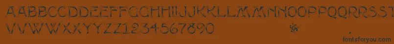 Multiformcaps Font – Black Fonts on Brown Background