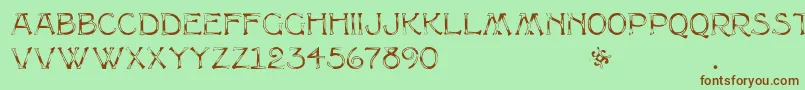 Multiformcaps Font – Brown Fonts on Green Background