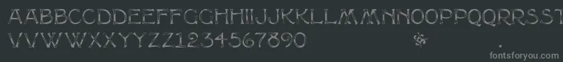 フォントMultiformcaps – 黒い背景に灰色の文字