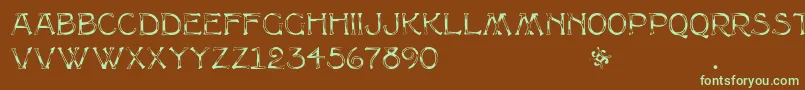 フォントMultiformcaps – 緑色の文字が茶色の背景にあります。