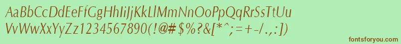 OptanecompactItalic-fontti – ruskeat fontit vihreällä taustalla