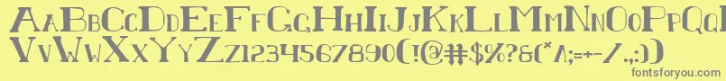ChardinDoihle-fontti – harmaat kirjasimet keltaisella taustalla