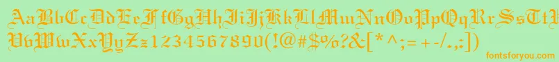 フォントElliott – オレンジの文字が緑の背景にあります。
