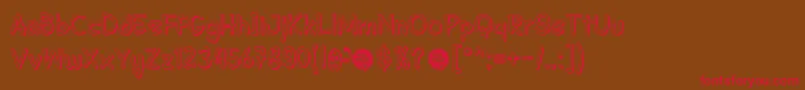 Fonte DhfSemangat2012ShadowDemo – fontes vermelhas em um fundo marrom