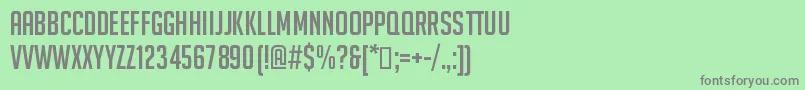 フォントBignoodletitling – 緑の背景に灰色の文字