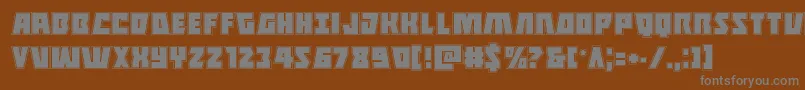 Halfshellheroacad-Schriftart – Graue Schriften auf braunem Hintergrund