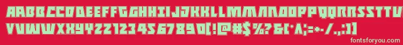 Halfshellheroacad-Schriftart – Grüne Schriften auf rotem Hintergrund