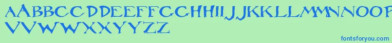 RackhamRegular Font – Blue Fonts on Green Background