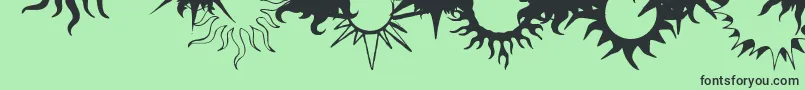 フォントFlamingStars26Splatters – 緑の背景に黒い文字