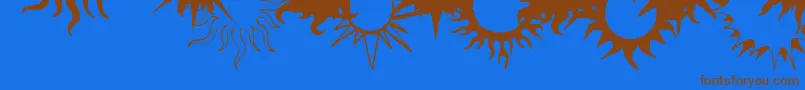 Czcionka FlamingStars26Splatters – brązowe czcionki na niebieskim tle