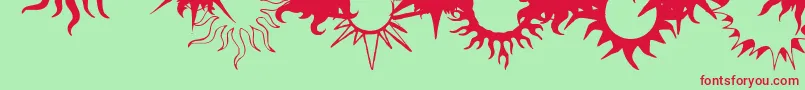 FlamingStars26Splatters-Schriftart – Rote Schriften auf grünem Hintergrund