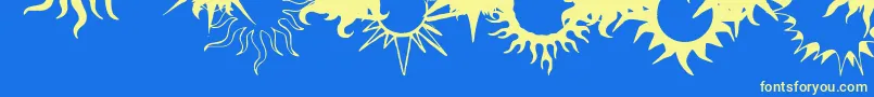 Czcionka FlamingStars26Splatters – żółte czcionki na niebieskim tle