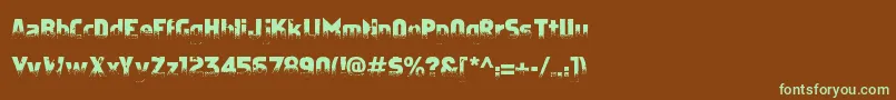 フォントApostateCancer – 緑色の文字が茶色の背景にあります。