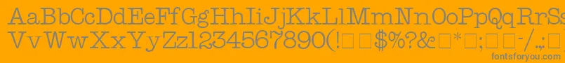 KeyboardDisplaySsi-fontti – harmaat kirjasimet oranssilla taustalla