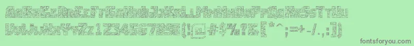 Breakingtime-fontti – harmaat kirjasimet vihreällä taustalla