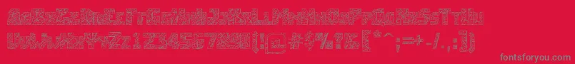 Breakingtime-fontti – harmaat kirjasimet punaisella taustalla