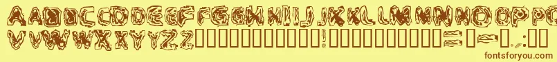 CriticalMass-Schriftart – Braune Schriften auf gelbem Hintergrund