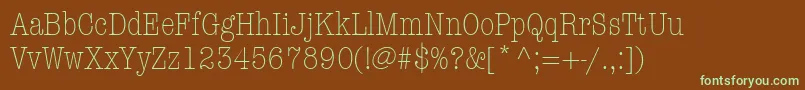 Fonte ItcAmericanTypewriterLtLightCondensed – fontes verdes em um fundo marrom