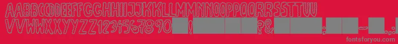 Czcionka JmhEscamasOut – szare czcionki na czerwonym tle