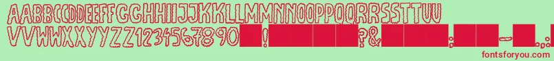 JmhEscamasOut-Schriftart – Rote Schriften auf grünem Hintergrund