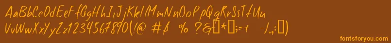 Goodfoot Font – Orange Fonts on Brown Background