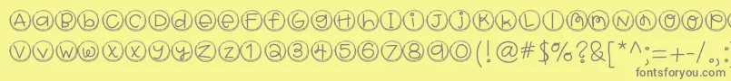 Hellobragtags-Schriftart – Graue Schriften auf gelbem Hintergrund