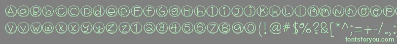 Hellobragtags-Schriftart – Grüne Schriften auf grauem Hintergrund