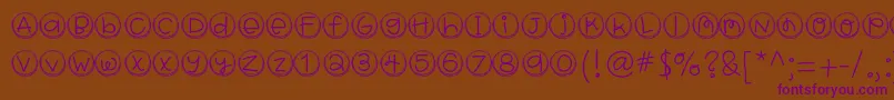 Hellobragtags-fontti – violetit fontit ruskealla taustalla