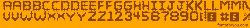 Czcionka Puffy – brązowe czcionki na pomarańczowym tle